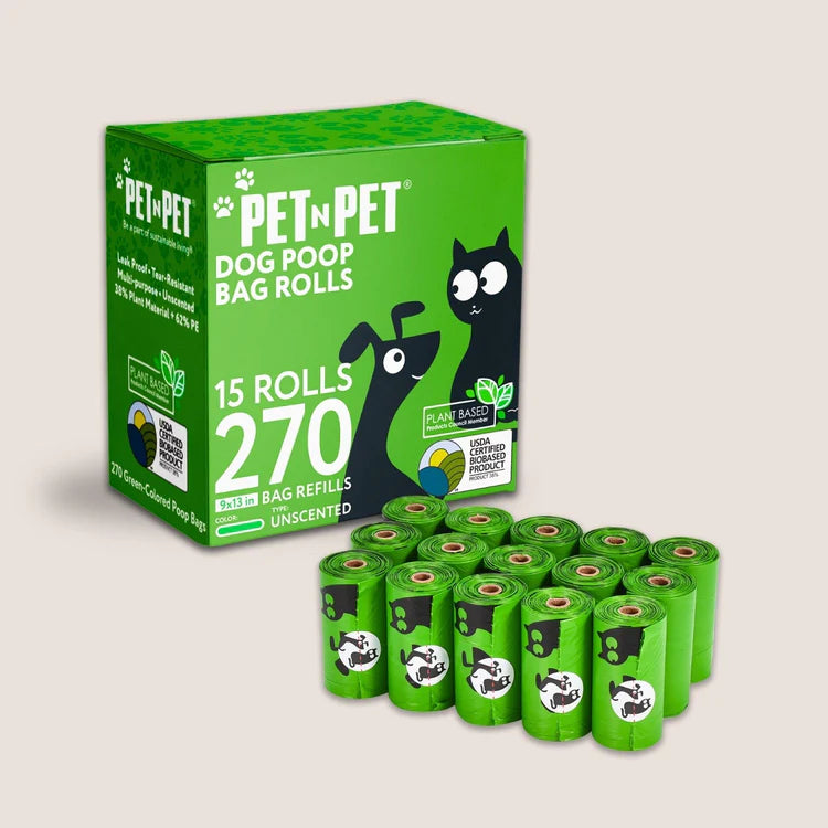 Pet n Pet Basic Line compostable dog poop bags in bright green measuring 9-by-13-inches with a cartoon cat and dog design, plant-based, and USDA certified.